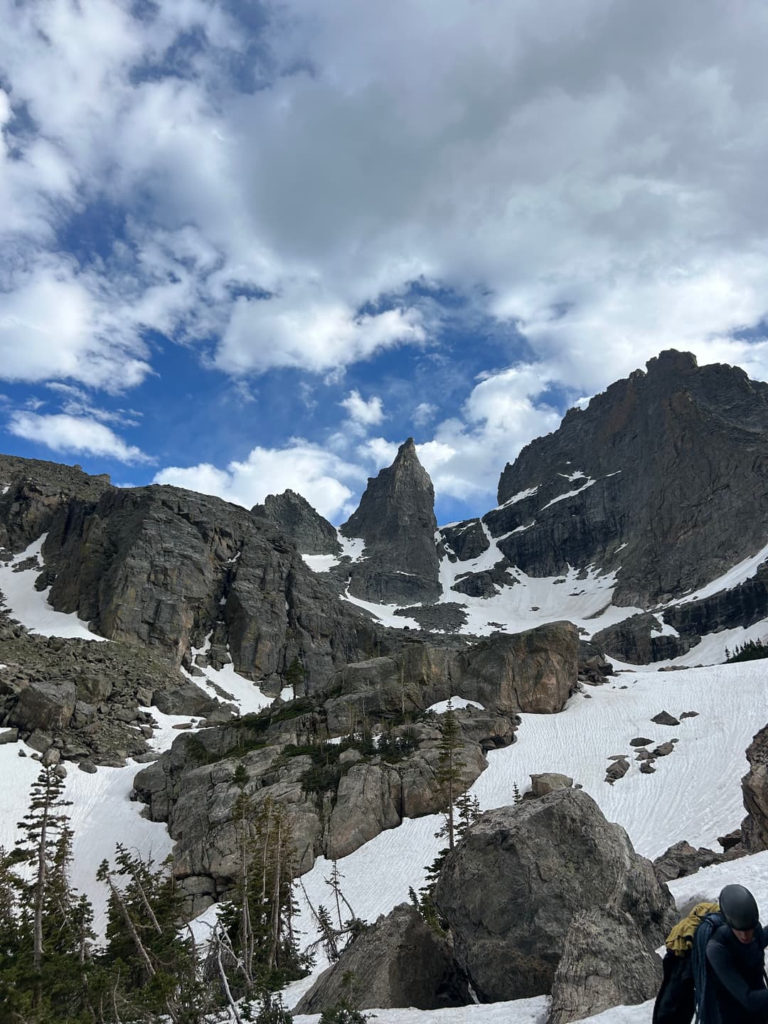 Looking up at Sharkstooth (middle) after reaching the base of the basin