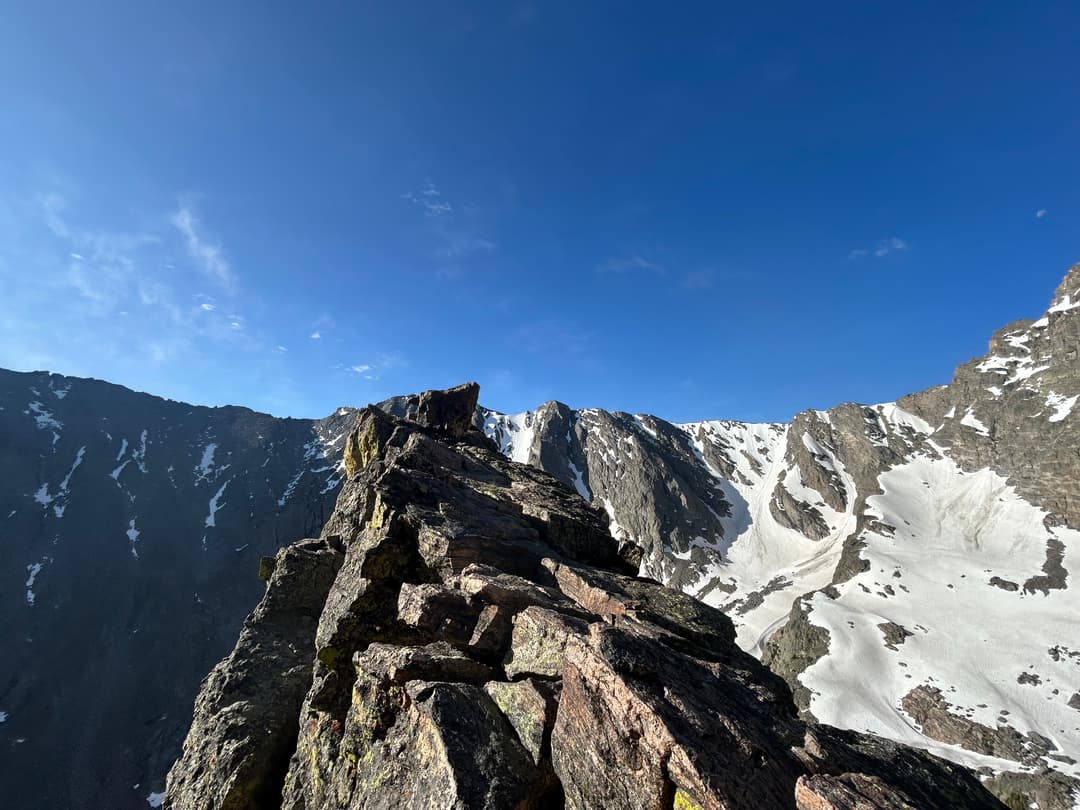 Looking across the tiny summit plateau from the rappel anchors